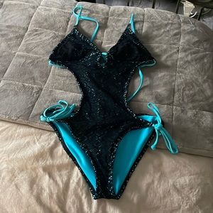 Black and blue one piece swimsuit (worn twice)
